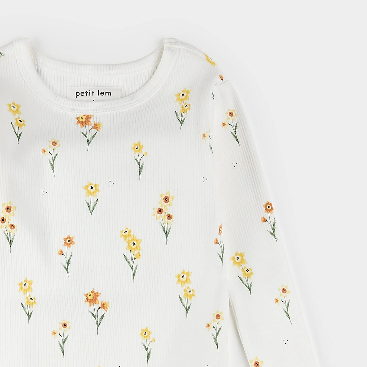 Back or alternate view of off-white daffodil print kids pajama top and pants