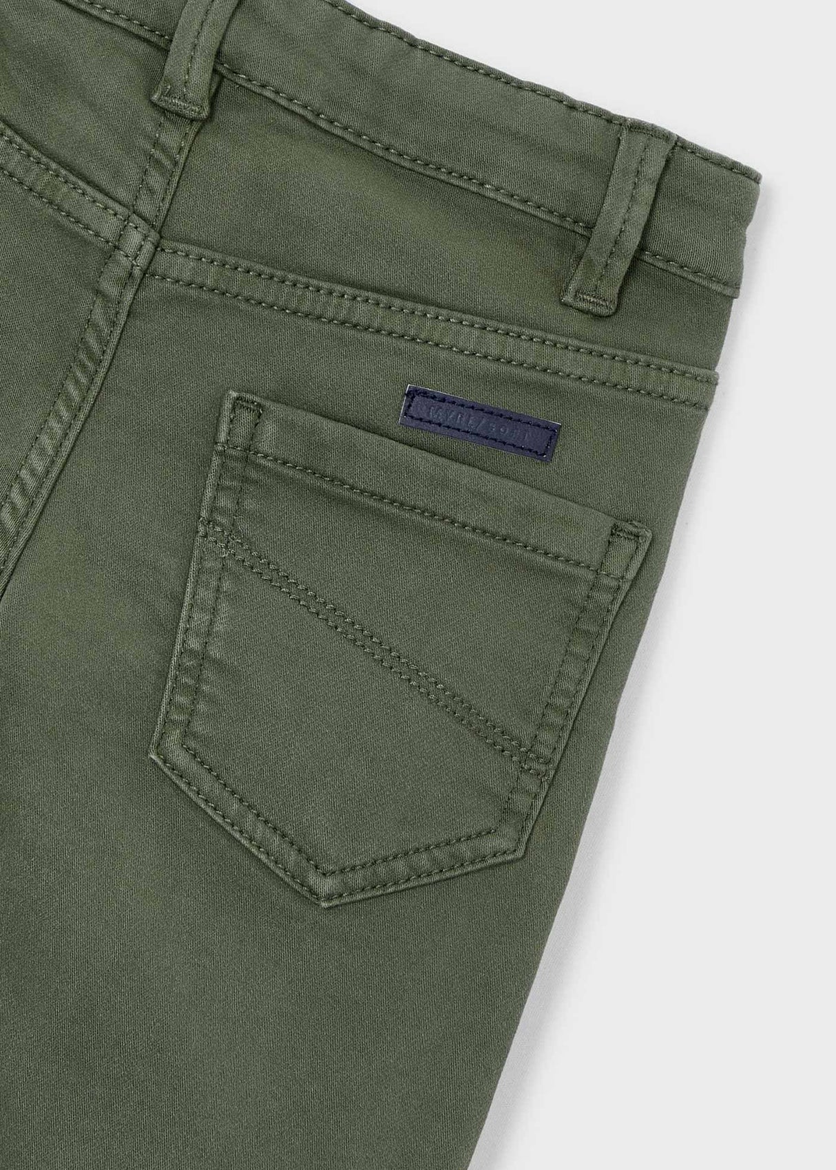 Closeup: inner adjustable elastic and classic zip & button (6Y+) detail.