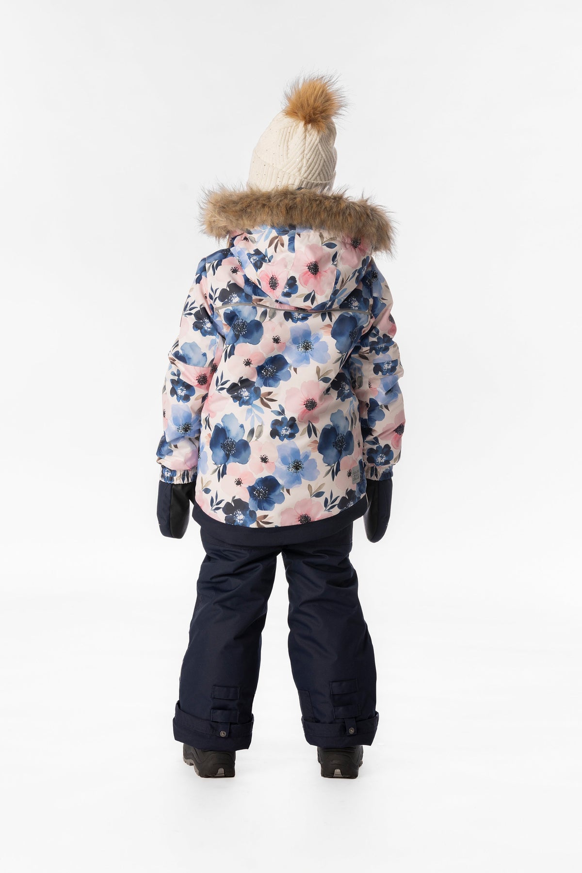 Child wearing the Deux par Deux PLAY snowsuit in watercolor flower print, lookbook view 3