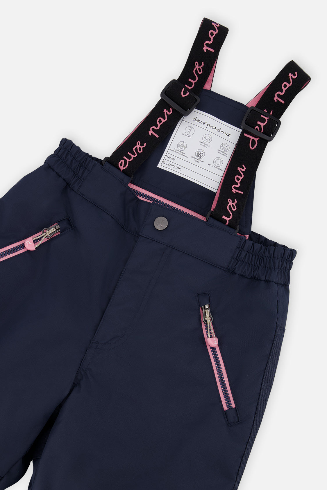 Close-up of the navy snow pants suspenders and zippered pocket