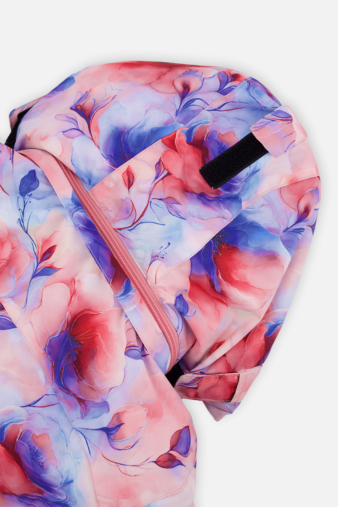 Close-up of the mauve watercolor floral PLAY jacket hood