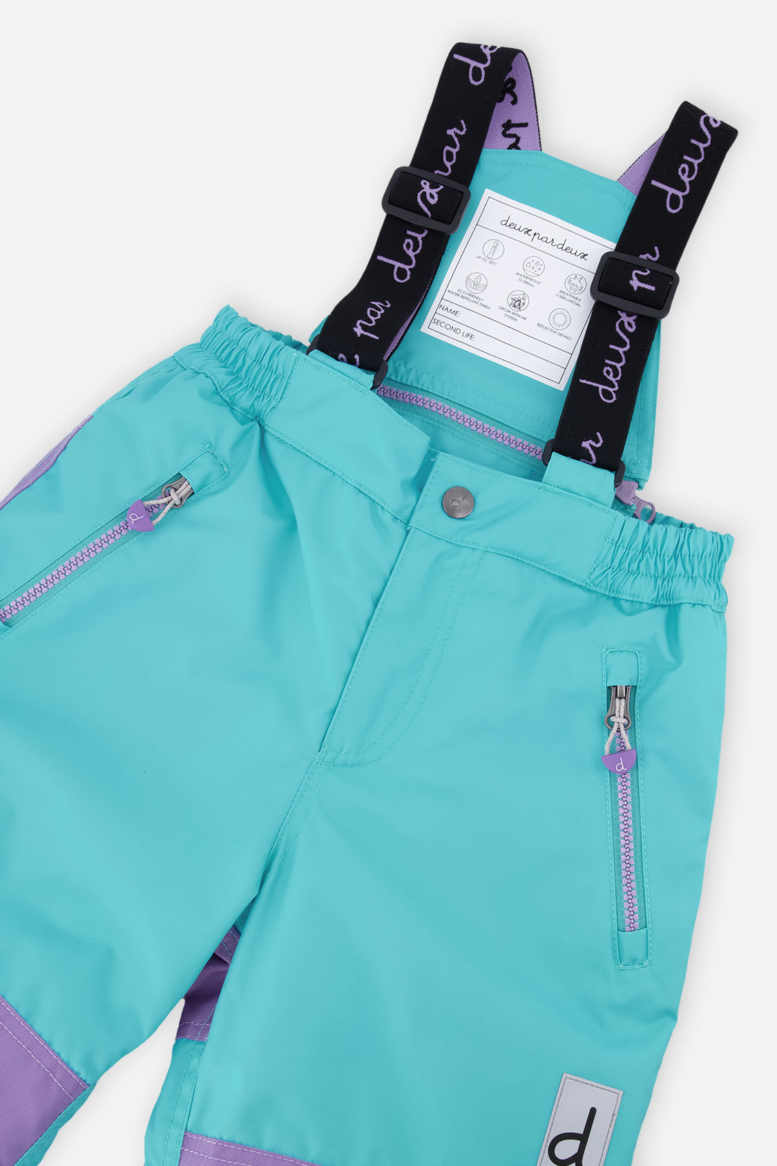 Deux par Deux girls' PLAY snowsuit with diamond-print jacket and turquoise and purple pants, further studio view