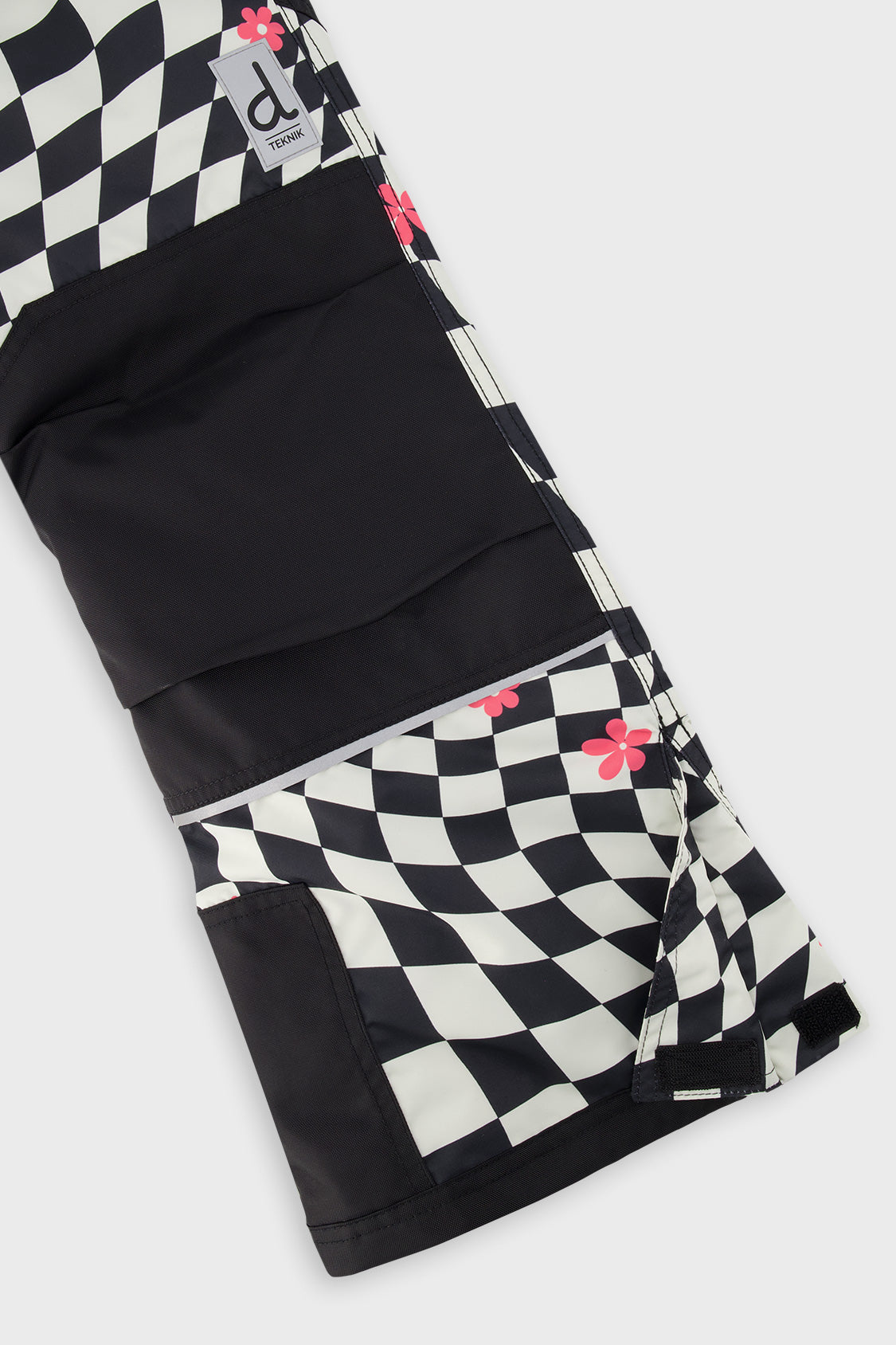 Deux par Deux girls' TEKNIK two-piece snowsuit in white and bright pink checkered print, extra product view