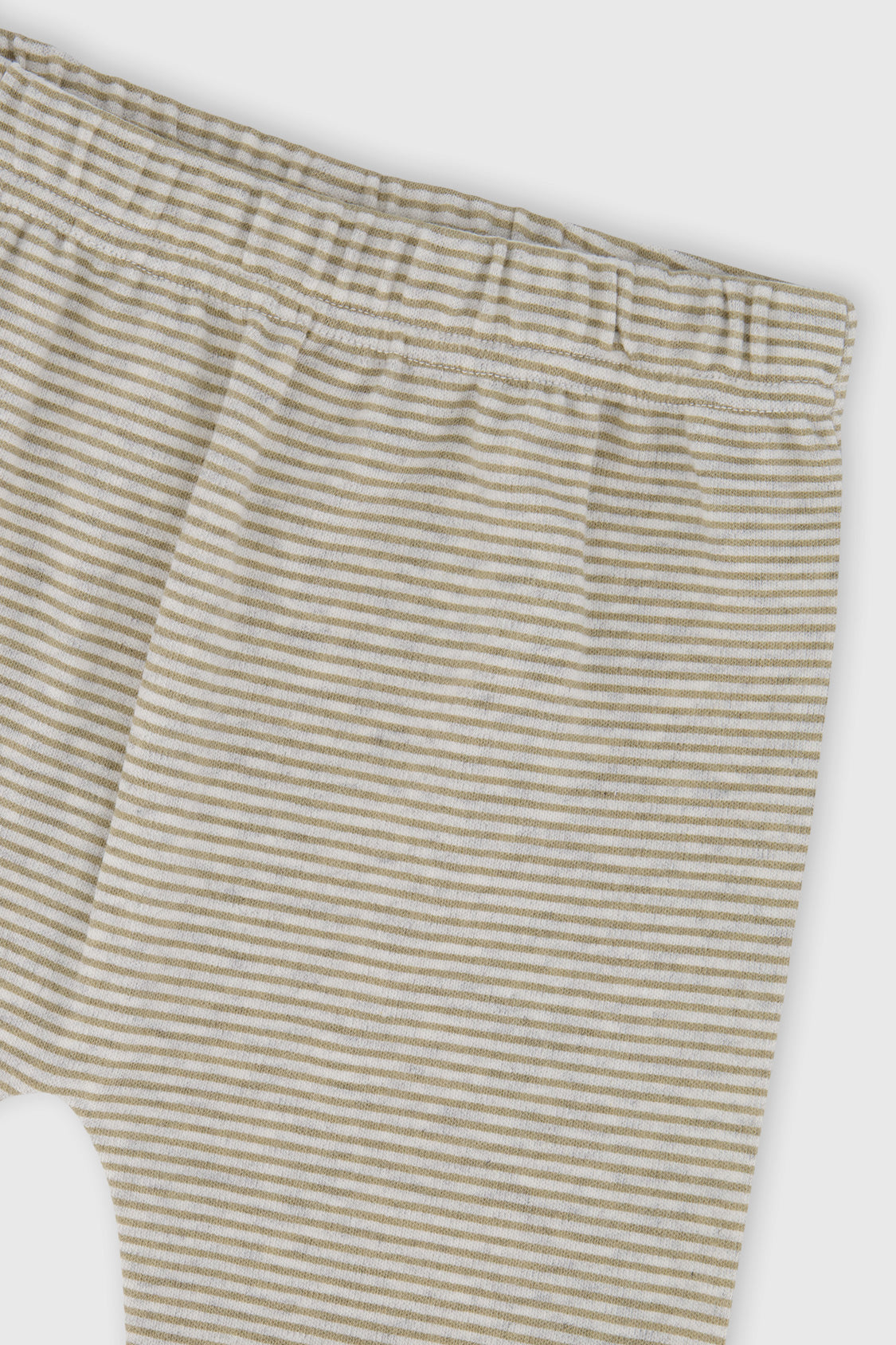 Close-up of the elastic waist and fine stripes on the Deux par Deux baby pants