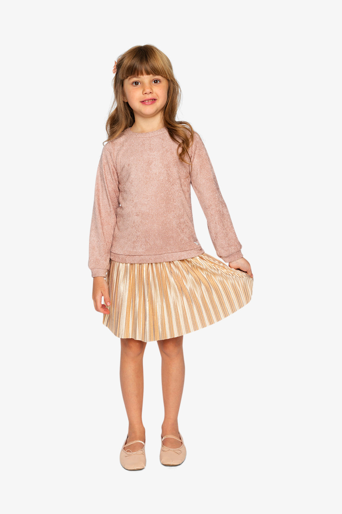Child wearing the Deux par Deux dusty pink dress with a pleated skirt and ballet flats