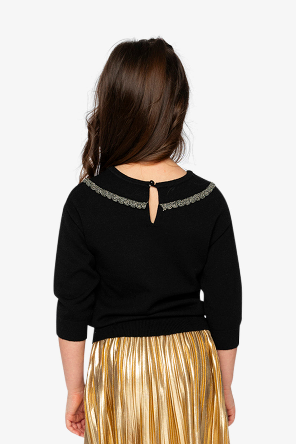 Back view of a child wearing the Deux par Deux black and gold knit sweater