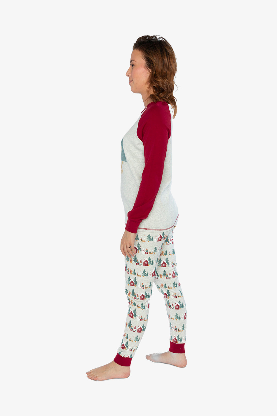 Woman wearing the Christmas pajama set in side view