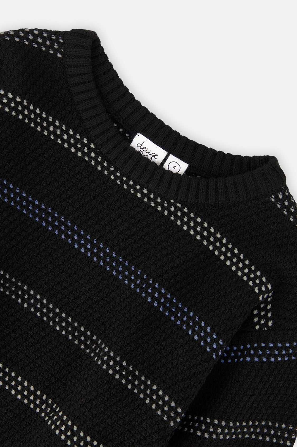Close-up of the white and blue dotted stripes and ribbed neckline on the black Deux par Deux sweater