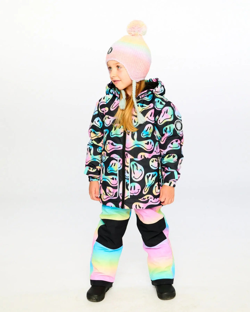 Lifestyle view of Deux par Deux rainbow snowsuit with fleece-lined hood