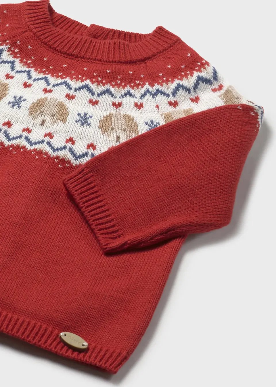Closeup of Fair Isle yoke on soft knit including recycled polyamide.
