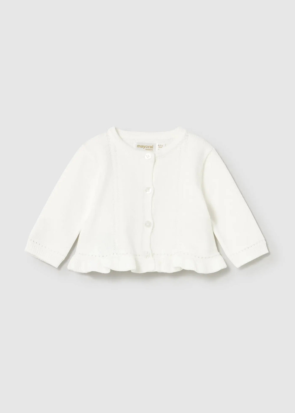 Front view Ivory newborn cardigan with ruffle hem and button closure