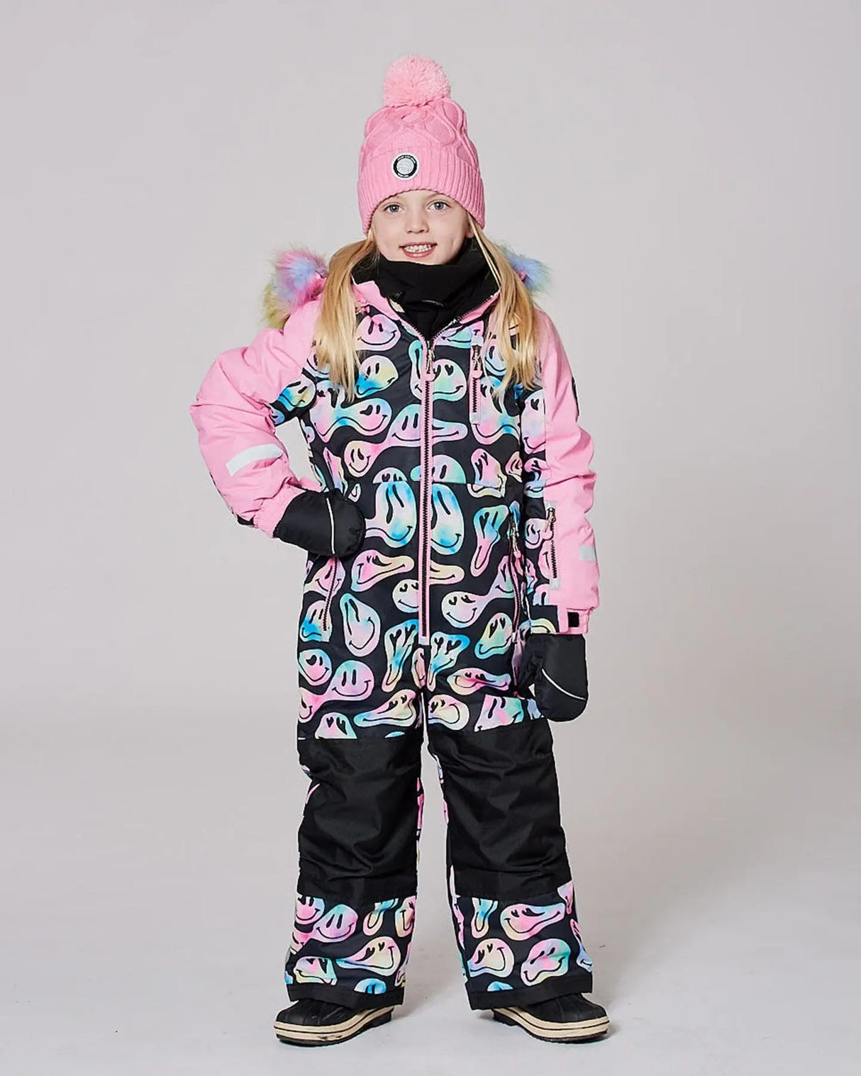 Front view of one-piece snowsuit with detachable hood and fleece lining.