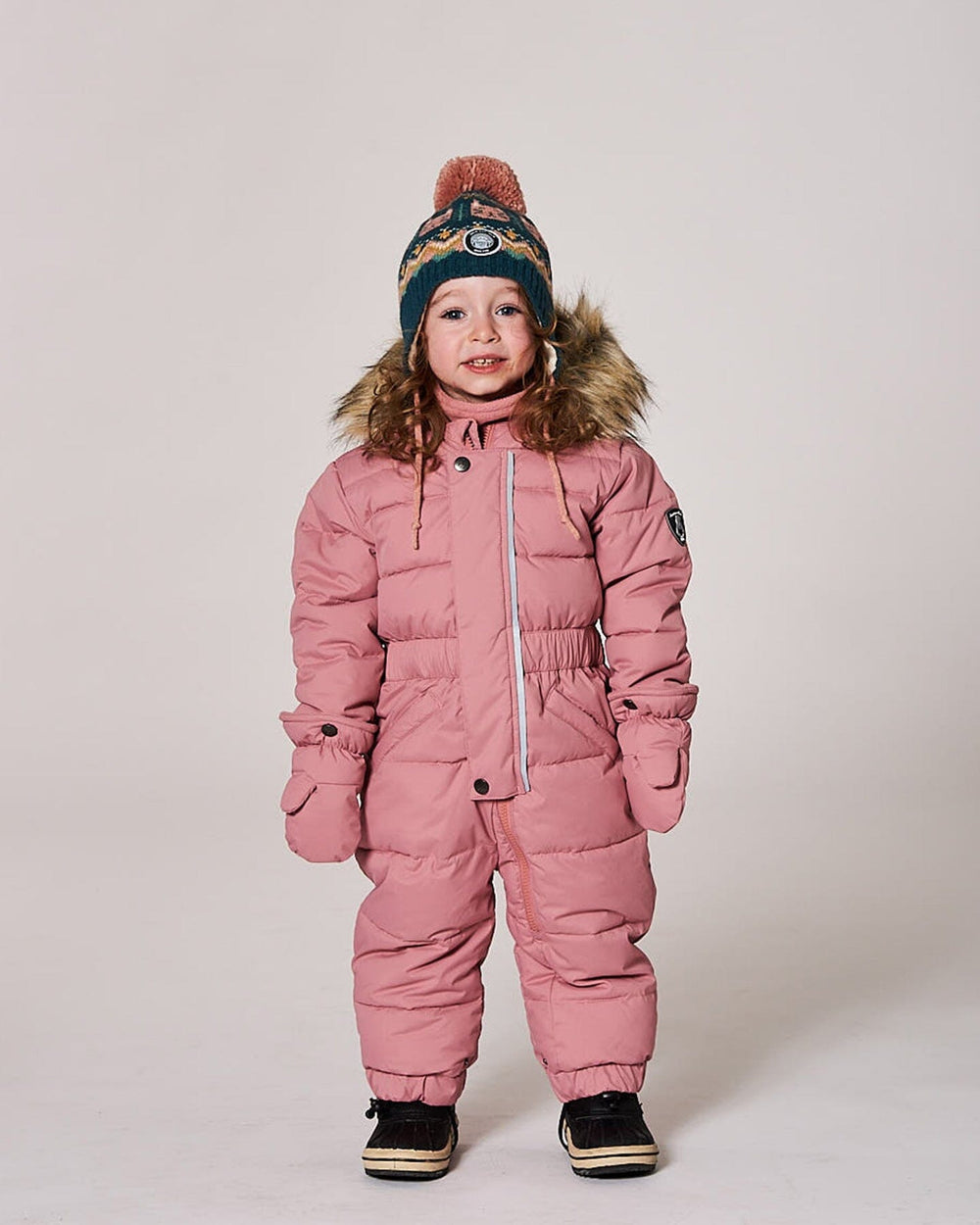 Model in one-piece pram suit pink with fleece-lined hood — almost gone