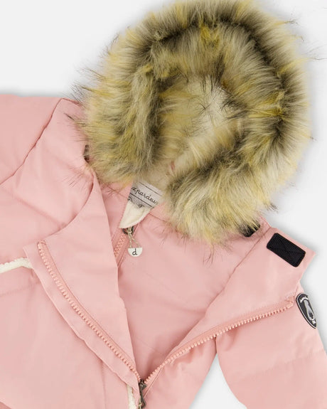 Flat lay — pink one-piece pram suit with detachable faux-fur hood, ready to ship — buy now.
