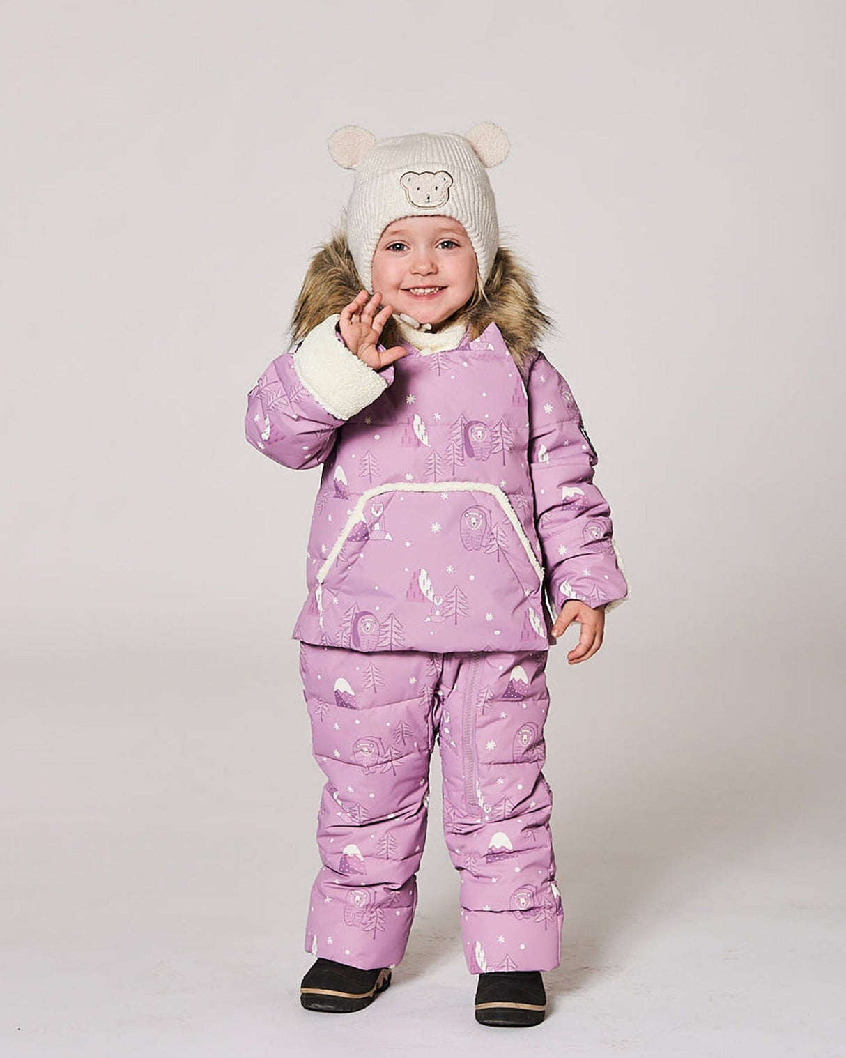 Model in one-piece pram suit purple bear, sherpa-lined hood — limited stock