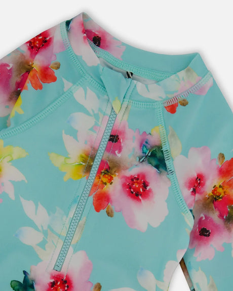 Printed One-Piece Rashguard With Frills Turquoise And Pink Flowers | Deux par Deux | Jenni Kidz