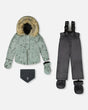 Infant jacket and snow pants set — printed sage green jacket with charcoal bib pants, −30C warmth.
