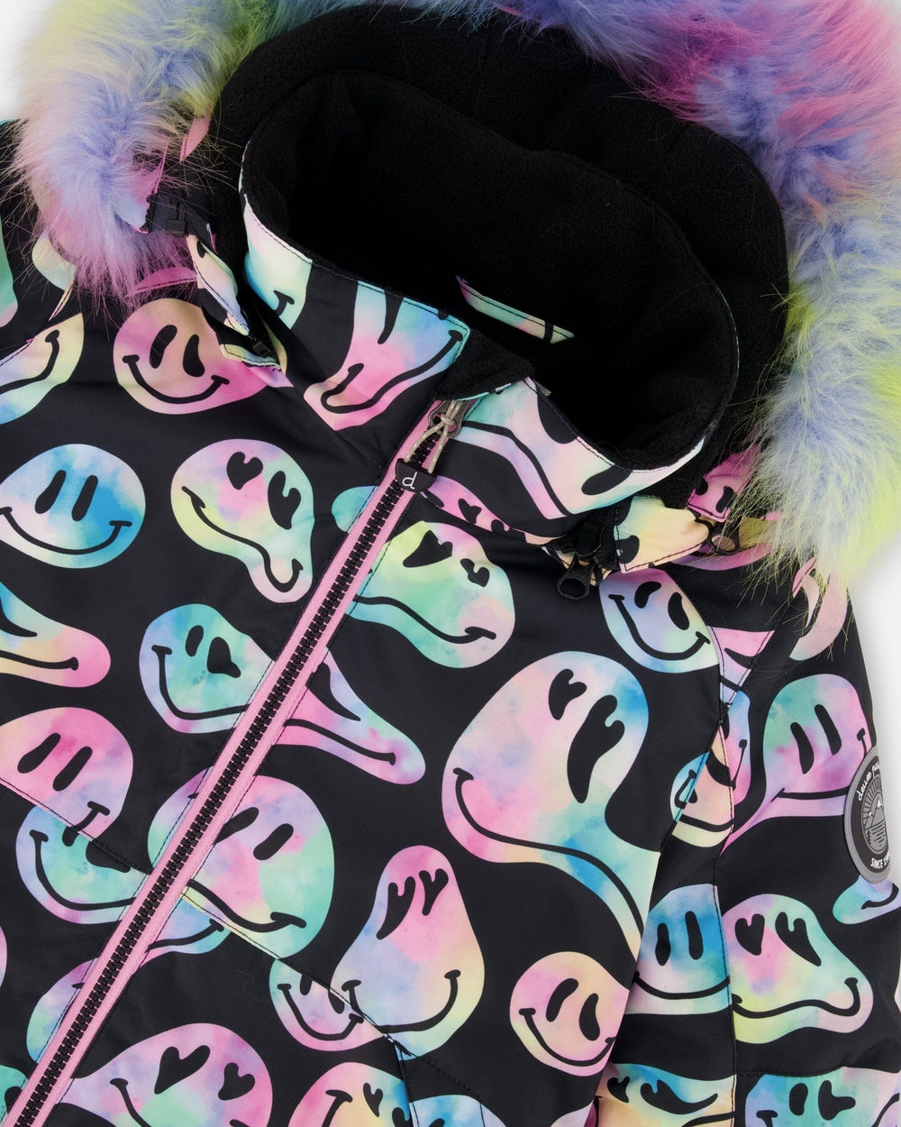 Detail of wind flap and chin guard, pink jacket two-piece ski suit