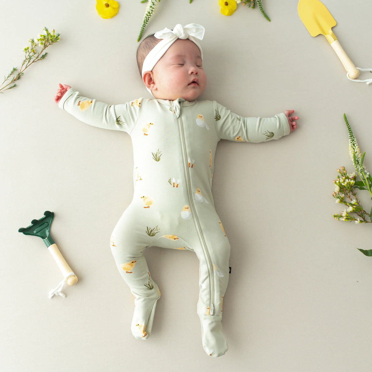 Zippered Footie in Aloe Chick | Kyte Baby