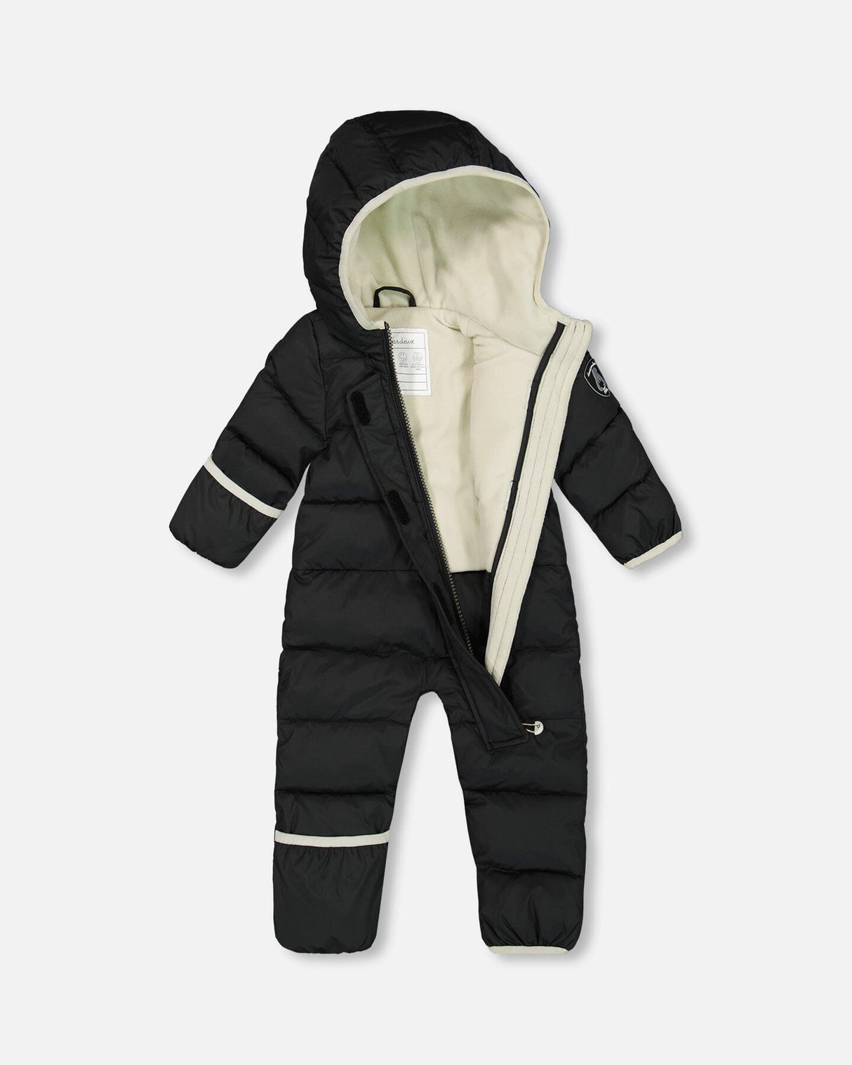 Lifestyle photo of toddler wearing the Deux par Deux navy animal snowsuit outdoors