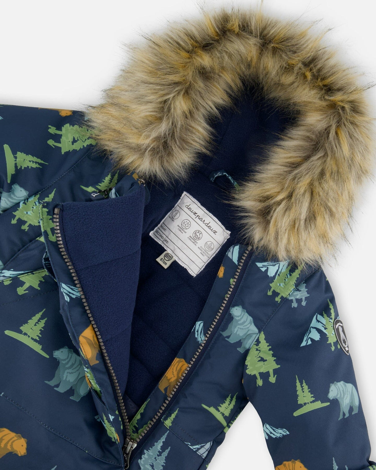 Hood with removable faux fur trim on the Deux par Deux navy animal print snowsuit