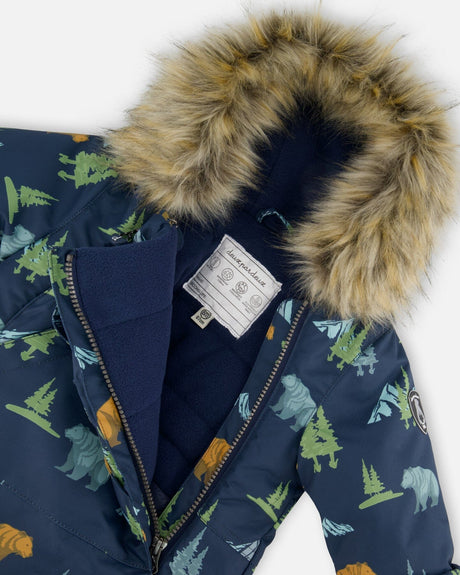 Hood with removable faux fur trim on the Deux par Deux navy animal print snowsuit