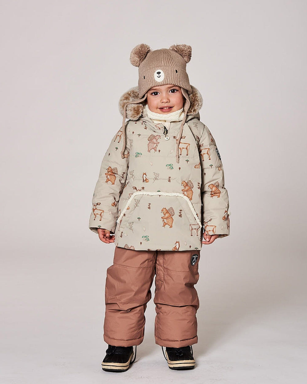 Close-up of the sherpa-lined hood, wind flap, and chin guard on the Chanterelle snowsuit