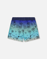 Back view of blue gradient beach print boardshorts for boys
