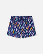 Front flat lay of Deux par Deux boy boardshorts in blue surfboard print