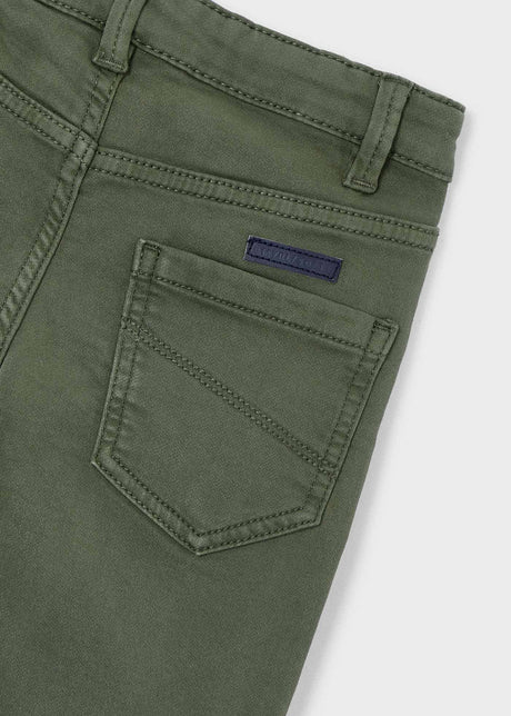 Closeup: inner adjustable elastic and classic zip & button (6Y+) detail.