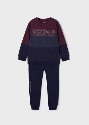 Mayoral boys burgundy navy sweatshirt jogger set with colorblock sweatshirt, navy joggers, and sporty slogan graphic.