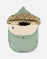 Deux par Deux baby bunting bag sage green with faux-fur hood — order now
