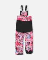 Close-up of reinforced knees and snow guards on Deux par Deux zebra print pants