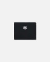 Color swatch detail — solid black Teknik snowsuit fabric