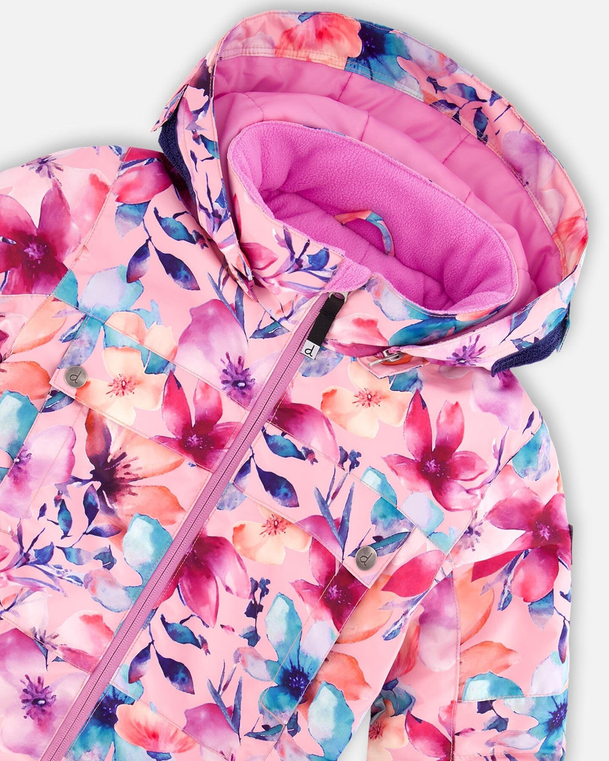 Detail of waterproof zipper pocket and ankle snow gaiter on the one-piece snowsuit