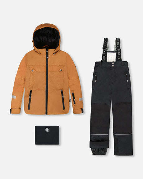 Deux par Deux two-piece Teknik snowsuit brown jacket with black bib pants – front view