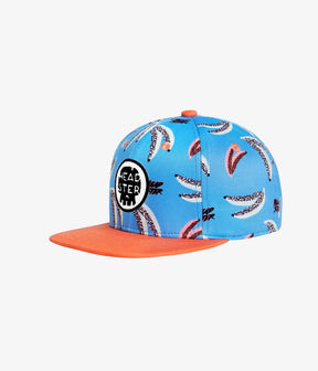 Sky blue Groovy Banana kids snapback with spotted banana print and orange brim, angled view
