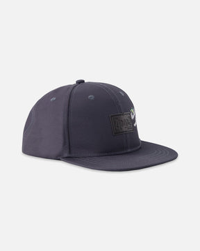 Deux par Deux boys' black flat-brim cap with dinosaur skeleton graphic, front view