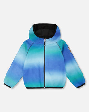 Deux par Deux hooded softshell jacket in a blue, aqua and green gradient with black trim and a black hood lining