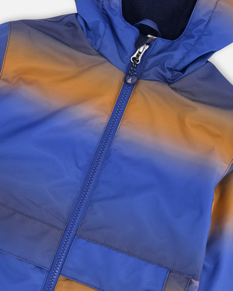 Deux par Deux boys' insulated mid-season set, blue and brown gradient jacket with blue pants – close-up of the jacket front zip