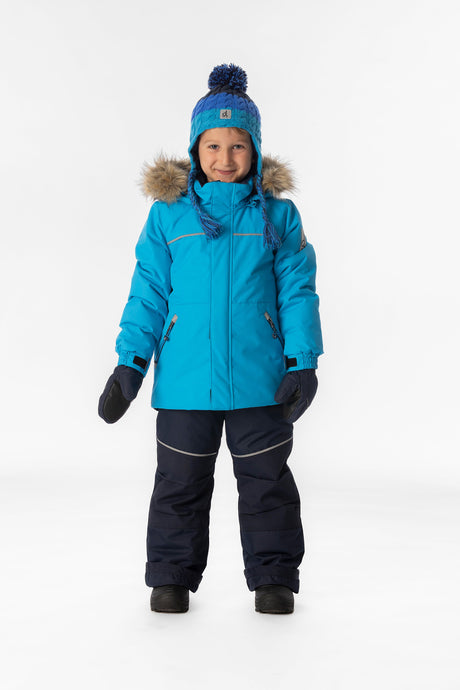 Child wearing the blue Deux par Deux DISCOVER snowsuit, lookbook view 1