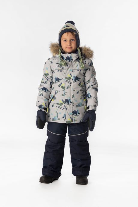 Child wearing the Deux par Deux DISCOVER snowsuit in grey skiing dinosaur print, lookbook view 1