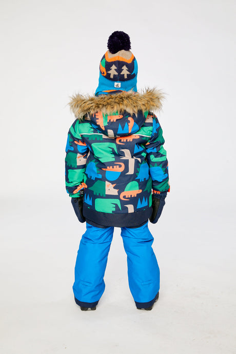 Child wearing the Deux par Deux DISCOVER snowsuit in Blue Dinosaur Print, lookbook view