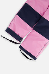Close-up of the pink CHILL snow pant leg with adjustable foot strap
