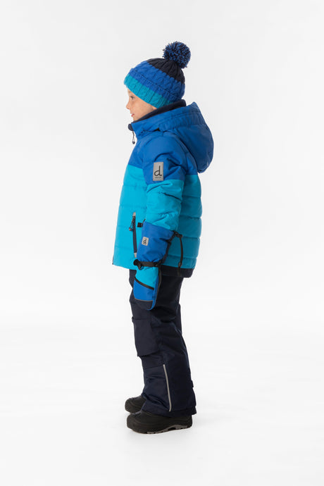 Child wearing the Deux par Deux PLAY snowsuit in light and dark blue, lookbook view 2
