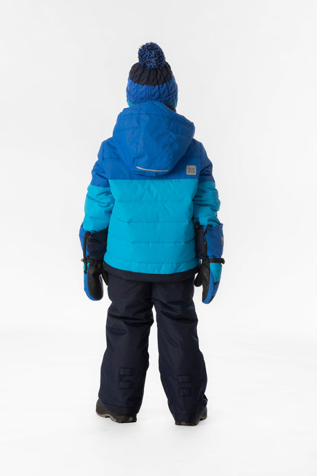 Child wearing the Deux par Deux PLAY snowsuit in light and dark blue, lookbook view 3