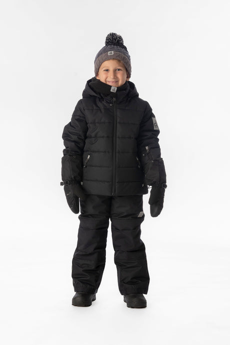 Child wearing the black Deux par Deux PLAY snowsuit, lookbook view 1