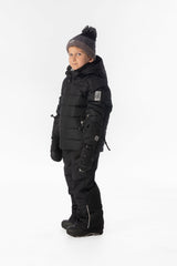 Child wearing the black Deux par Deux PLAY snowsuit, lookbook view 2