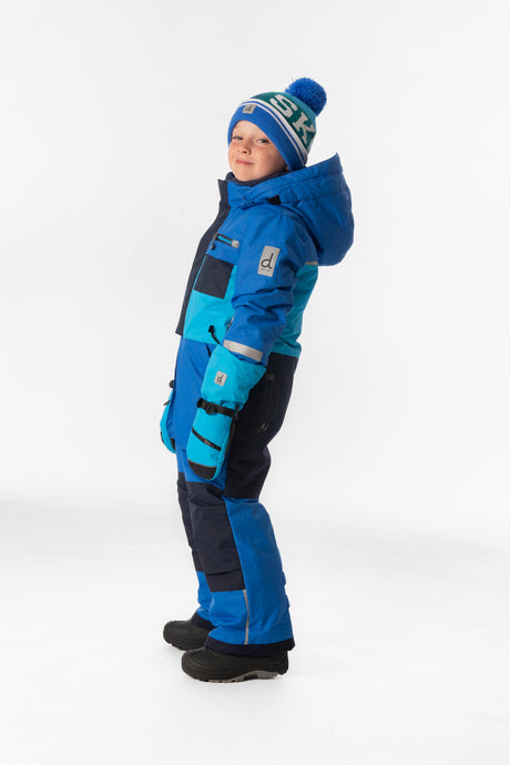 Deux par Deux boys' PLAY one-piece snowsuit in light and dark blue – worn by a model, view 2