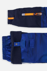 Grow-with-me sleeve extension and adjustable hem on the navy and blue snowsuit